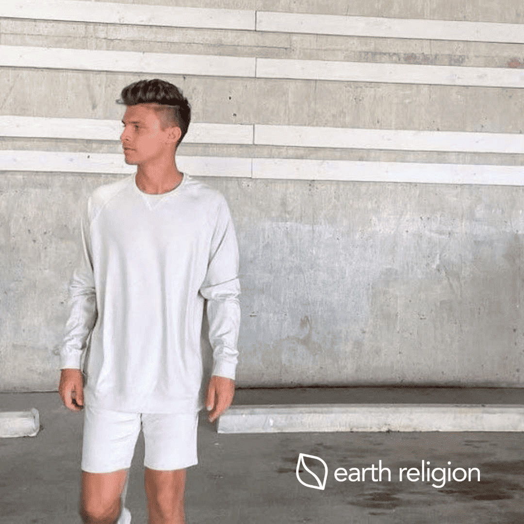 A dedicated man dressed in all white active wear from Cozy Earth